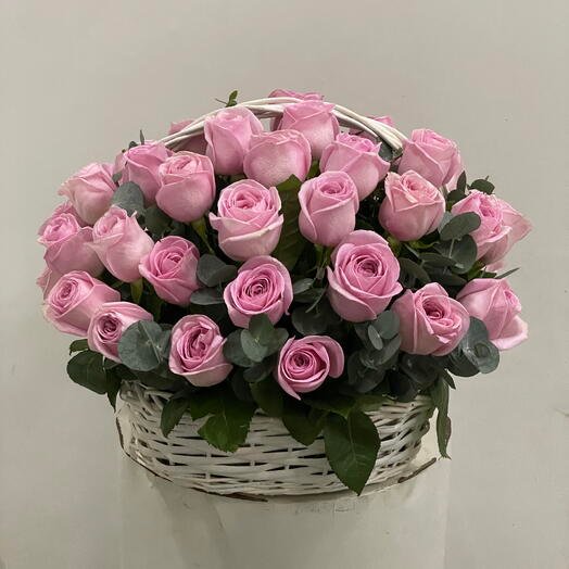 Pink roses basket arrangement by Magic Flor Dubai