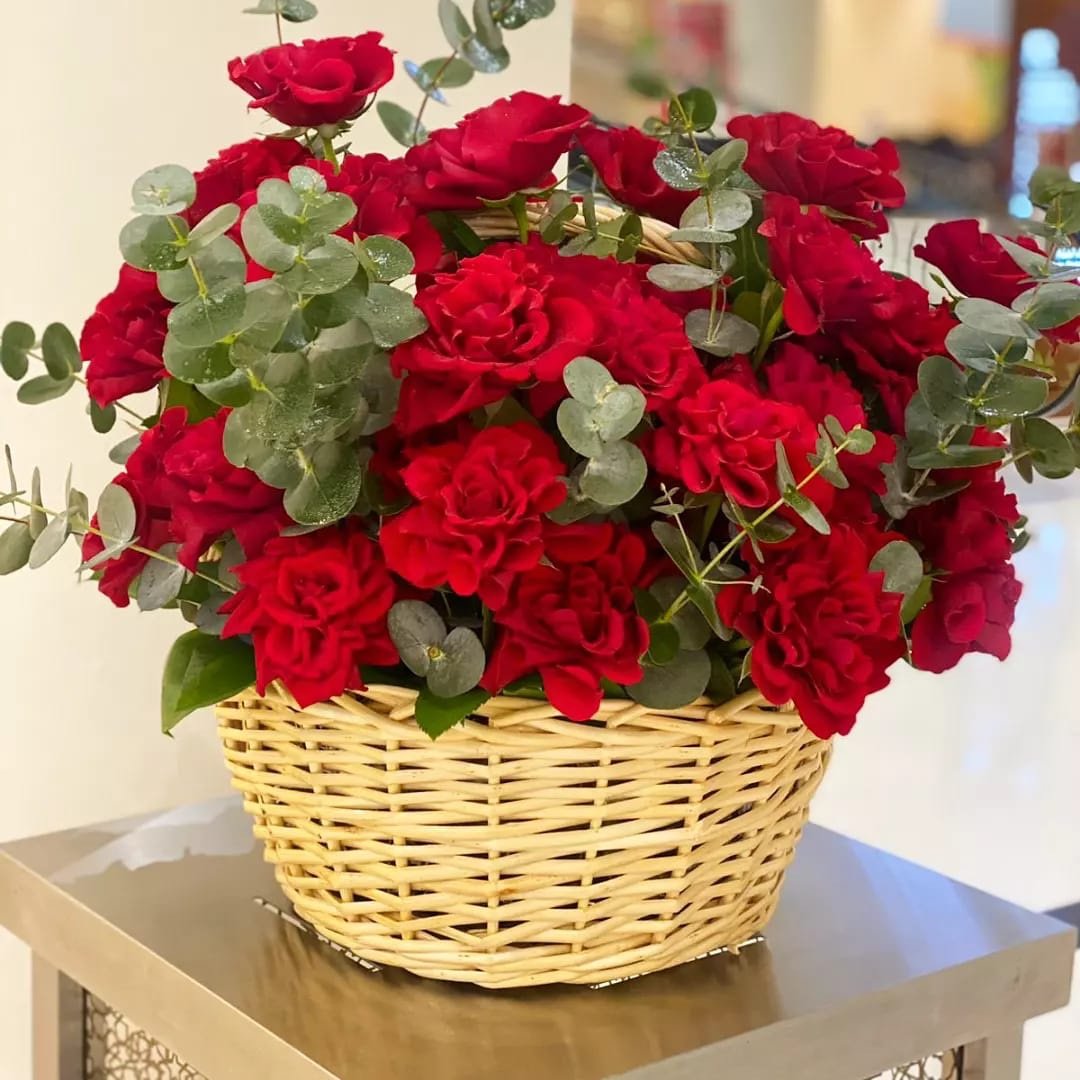 Reflex red roses basket arrangement by Magic Flor Dubai